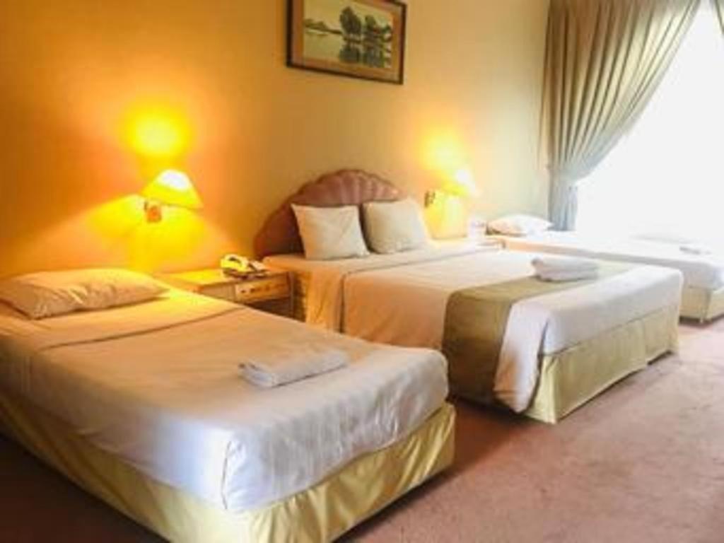 New Grand Park Hotel Surabaia Exterior foto